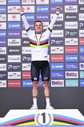 World champion Belgian Remco Evenepoel celebrates on the podium the men s elite individual time trial race (39,2km) at the cycling UCI Road World Championship, WM, Weltmeisterschaft in Montreal, Canada, Sunday 20 September 2026. JASPERxJACOBS  x187204803x
