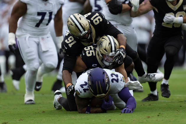 BALTIMORE, MD - SEPTEMBER 20: Baltimore Ravens running back Derrick Henry (22) gets tackled in the back field by New Orleans Saints linebacker Kaden Elliss (55) and New Orleans Saints defensive tackle Vernon Broughton (91) during a NFL, American Football Herren, USA football game between New Orleans Saints and Baltimore Ravens September 20, 2026 at M&T Bank Stadium in Baltimore, MD (Photo by Charles Brock Icon Sportswire) NFL: SEP 20 Saints at Ravens EDITORIAL USE ONLY Icon260920044