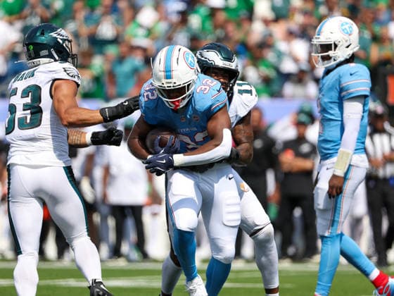 Sep 20, 2026; Nashville, TN, USA; Tennessee Titans running back Nicholas Singleton (32) is stopped for a loss by Philadelphia Eagles linebacker Jihaad Campbell (11) during the NFL, American Football Herren, USA regular season game between the Philadelphia Eagles and Tennessee Titans at Nissan Stadium. Mandatory Credit: -Cal Media Nashville USA - ZUMAc04_ 20260920_zma_c04_079 Copyright: xStephenxFurstx