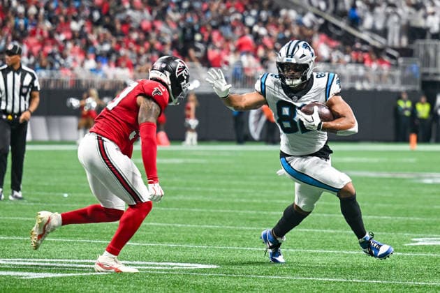 ATLANTA, GA - SEPTEMBER 20: Carolina tight end Tommy Tremble (82) stiff-arms Atlanta safety Xavier Watts (31) during the NFL, American Football Herren, USA game between the Carolina Panthers and the Atlanta Falcons on September 20th, 2026 at Mercedes-Benz Stadium in Atlanta, GA. (Photo by Rich von Biberstein Icon Sportswire) NFL: SEP 20 Panthers at Falcons EDITORIAL USE ONLY Icon260920022