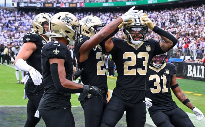 New Orleans Saints safety Julian Blackmon (23) celebrates an interception against the Baltimore Ravens late in the fourth quarter at M&T Bank Stadium in Baltimore, Maryland, on Sunday, September 20, 2026. The New Orleans Saints won 24-17.  BAL20260920129 DAVIDxTULIS