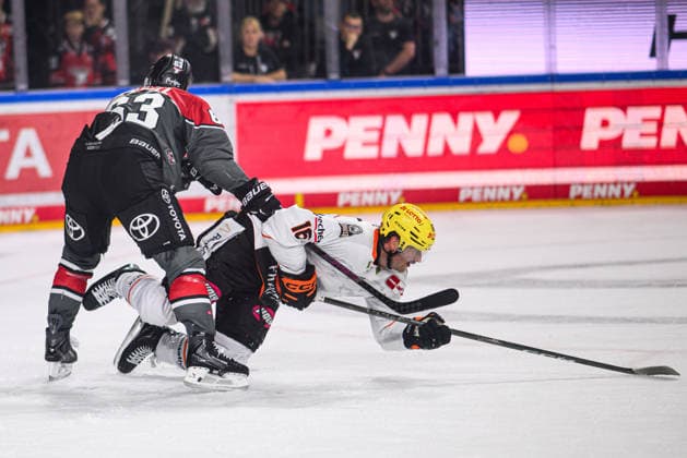 COLOGNE, GERMANY - 20 SEPTEMBER, 2026: Patrick Russell, Konrad Abeltshauser - The PENNY DEL Ice hockey, Eishockey match Koelner Haie vs. Loewen Frankfurt at LANXESS arena.  Copyright: xVitaliixKliuievx