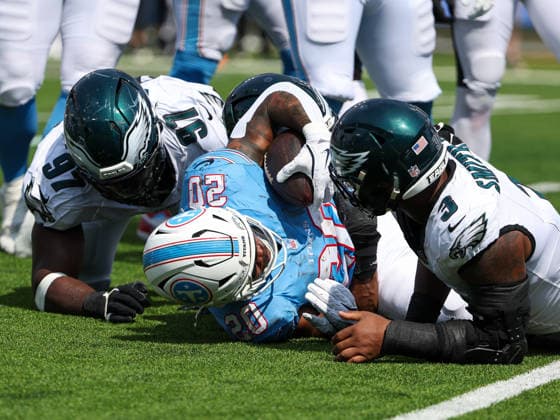 Sep 20, 2026; Nashville, TN, USA; Tennessee Titans running back Tony Pollard (20) is tackled by Philadelphia Eagles defensive tackle Moro Ojomo (97) and linebacker Nolan Smith Jr. (3) during the NFL, American Football Herren, USA regular season game between the Philadelphia Eagles and Tennessee Titans at Nissan Stadium. Mandatory Credit: -Cal Media NFL 2026: Eagles Vs Titans SEP 20  - ZUMAc04_ 20260920_zma_c04_065 Copyright: xStephenxFurstx