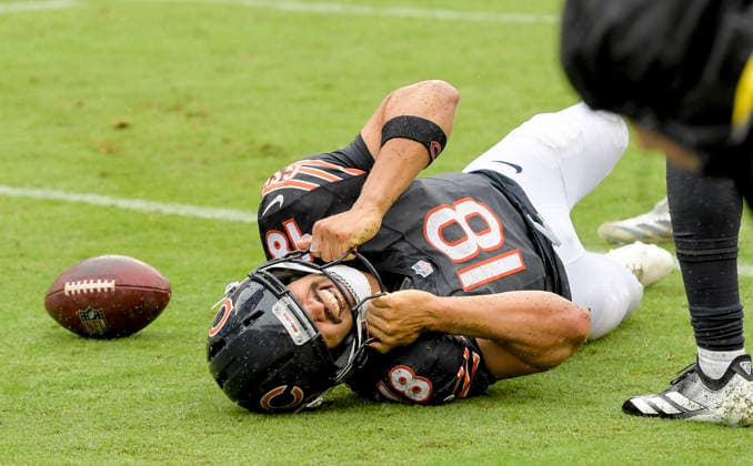 Chicago Bears quarterback Caleb Williams (18) grimaces in pain after going down late in the fourth quarter against the Minnesota Vikings at Soldier Field in Chicago on Sunday, September 20, 2026. Williams was eventually take off the field on the cart. Vikings defeated the Bear 9-6.  CHI20260920121 MARKxBLACK