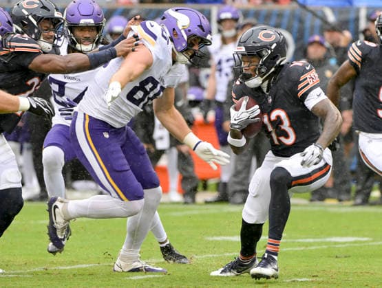 Chicago Bears wide receiver Zavion Thomas (13) manovers to get around Minnesota Vikings tight end Gavin Bartholomew (86) during a game at Soldier Field in Chicago on Sunday, September 20, 2026. Vikings defeated the Bear 9-6.  CHI20260920136 MARKxBLACK