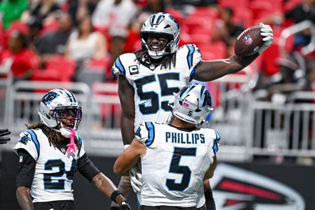 ATLANTA, GA - SEPTEMBER 20: Carolina linebacker Jaelan Phillips (5) lifts linebacker Devin Lloyd (55) into the air during the NFL, American Football Herren, USA game between the Carolina Panthers and the Atlanta Falcons on September 20th, 2026 at Mercedes-Benz Stadium in Atlanta, GA. (Photo by Rich von Biberstein Icon Sportswire) NFL: SEP 20 Panthers at Falcons EDITORIAL USE ONLY Icon260920046