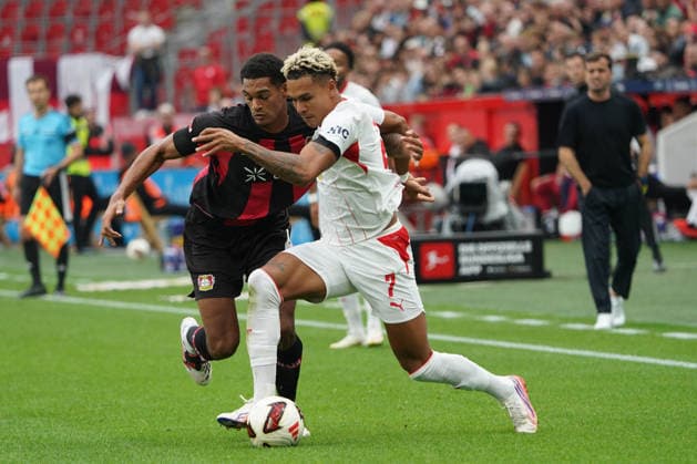 Leverkusen Soccer, Bundesliga Season 2026–2027: Bayer 04 Leverkusen vs. RB Leipzig, September 20, 2026, Bayarena, Leverkusen; Jarell Quansah, Bayer 04 Leverkusen; Great Britain (GB); Antonio Nusa, RB Leipzig;