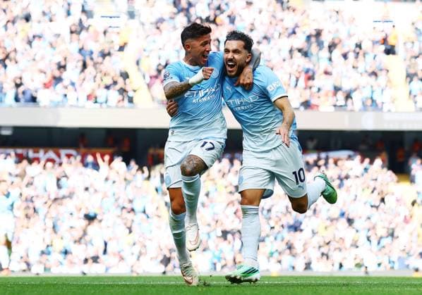 Rayan Cherki of Manchester City celebrates scoring a goal to make it 2-1 with Enzo Fernandez Manchester City v Sunderland, Premier League, Football, Etihad Stadium, Manchester, UK - 20 Sep 2026Manchester Etihad Stadium United Kingdom EDITORIAL USE ONLY No use with unauthorised audio, video, data, fixture lists, club league logos or live services. Online in-match use limited to 120 images, no video emulation. No use in betting, games or single club league player publications.  Copyright: xMattxWest Shutterstockx 17160119dn