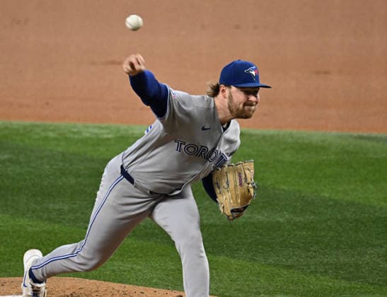 Toronto Blue Jays starting pitcher Spencer Miles throws against the Texas Rangers during the first inning at Globe Life Field on Sunday, September 20, 2026, in Arlington, TX. he Blue Jays defeated the Rangers 7-2.  ARL2026092004 IANxHALPERIN