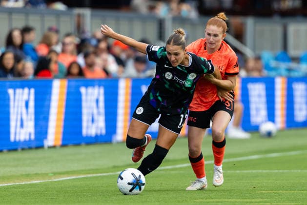 SAN JOSE, CA - SEPTEMBER 20: Quincy McMahon 12 of Racing Louisville FC and Jenna Nighswonger 31 of Bay FC battle for the ball during a NWSL match on September 20, 2026 at PayPal Park in San Jose, CA. (Photo by Matthew Huang Icon Sportswire) SOCCER: SEP 20 NWSL Bay FC vs Racing Louisville EDITORIAL USE ONLY Icon260920001