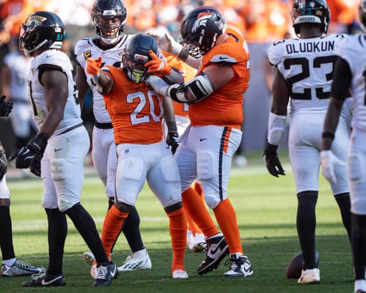 Sep 20, 2026; Denver Broncos running back Jonah Coleman (20) indicates first down during the game between the Denver Broncos and Jacksonville Jaguars in Denver, CO, USA; at Empower Field at Mile High. Mandatory Credit: -Cal Media NFL, American Football Herren, USA 2026: Jaguars Vs Broncos SEP 20  - ZUMAc04_ 20260920_zma_c04_258 Copyright: xDerekxRegensburgerx