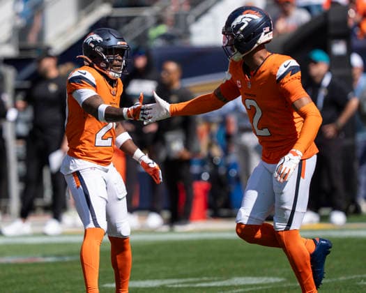 Sep 20, 2026; Denver Broncos cornerback Ja quan McMillian (29) celebrates a pass breakup with teammate Denver Broncos cornerback Pat Surtain II (2) during the game between the Denver Broncos and Jacksonville Jaguars in Denver, CO, USA; at Empower Field at Mile High. Mandatory Credit: -Cal Media - ZUMAc04_ 20260920_zma_c04_268 Copyright: xDerekxRegensburgerx