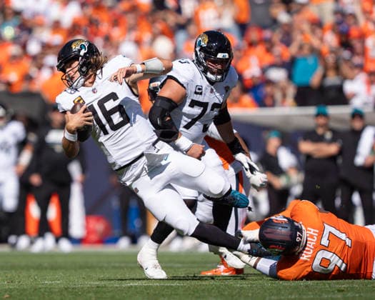 Sep 20, 2026; Denver Broncos defensive tackle Malcolm Roach (97) sacks Jacksonville Jaguars quarterback Trevor Lawrence (16) during the game between the Denver Broncos and Jacksonville Jaguars in Denver, CO, USA; at Empower Field at Mile High. Mandatory Credit: -Cal Media - ZUMAc04_ 20260920_zma_c04_308 Copyright: xDerekxRegensburgerx
