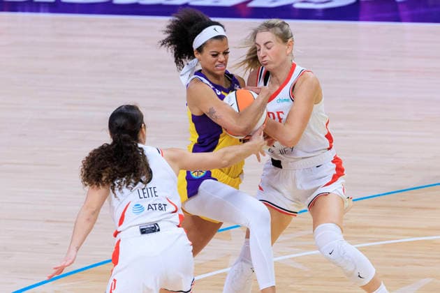 September 20, 2026, Los Angeles, California, USA: Karlie Samuelson 44 of the Portland Fire fouls Rae Burrell 12 of the Los Angeles Sparks during their regular season WNBA, Basketball Damen, USA game on Sunday September 20, 2026 at Crypto.com Arena in Los Angeles, California. Sparks defeat Fire, 105-84. ARIANA RUIZ PI Sparks Defeat Fire, 105-84 - ZUMAp124 20260920_zaa_p124_044 Copyright: xArianaxRuizx