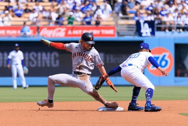 September 20, 2026, Los Angeles, California, USA: Mookie Betts 50 of the Los Angeles Dodgers fails to tag Jonah Cox 53 of the San Francisco Giants at second base during a regular-season MLB, Baseball Herren, USA game against the San Francisco Giants on Sunday September 20, 2026 at Dodger Stadium in Los Angeles, California. Dodgers defeat Giants, 3-1. JAVIER ROJAS PI Los Angeles USA - ZUMAp124 20260920_zaa_p124_068 Copyright: xJavierxRojasx