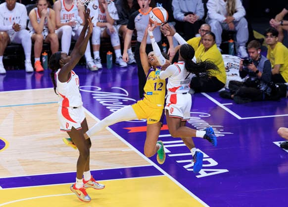 September 20, 2026, Los Angeles, California, USA: Jordan Harrison 2 of the Portland Fire fouls Rae Burrell 12 of the Los Angeles Sparks on a layup during their regular season WNBA, Basketball Damen, USA game on Sunday September 20, 2026 at Crypto.com Arena in Los Angeles, California. Sparks defeat Fire, 105-84. ARIANA RUIZ PI Los Angeles USA - ZUMAp124 20260920_zaa_p124_116 Copyright: xArianaxRuizx