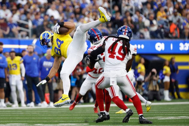 INGLEWOOD, CA - SEPTEMBER 21: Los Angeles Rams tight end Colby Parkinson (84) leaps over New York Giants cornerback Dru Phillips (22) during the NFL, American Football Herren, USA game between the New York Giants and the Los Angeles Rams on September 21, 2026, at SoFi Stadium in Inglewood, CA. (Photo by Jevone Moore Icon Sportswire) NFL: SEP 21 Giants at Rams EDITORIAL USE ONLY Icon260921878