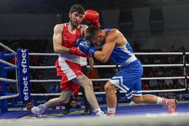 2026 European Boxing Elite Championships In Sofia - Quarter-Finals SOFIA, BULGARIA - SEPTEMBER 21: Ismail Mutsolgov of Russia (red) lands a counter right hook under the guard of Almir Memic of Serbia (blue) during their Elite Men s 75kg division preliminary round bout at the 2026 European Boxing Elite Championships in Sofia, Bulgaria, on September 21, 2026. Sofia Bulgaria  Copyright: xArturxWidakx originalFilename:widak-european260921_npF0O.jpg