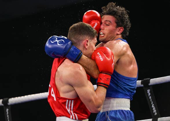2026 European Boxing Elite Championships In Sofia - Quarter-Finals SOFIA, BULGARIA - SEPTEMBER 21: Gabriele Guidi Rontani of Italy (red) and Jon McConnell of Ireland (blue) trade combinations at close range during the 2026 European Boxing Elite Championships in Sofia, Bulgaria, on September 21, 2026. Sofia Bulgaria  Copyright: xArturxWidakx originalFilename:widak-european260921_npx2C.jpg