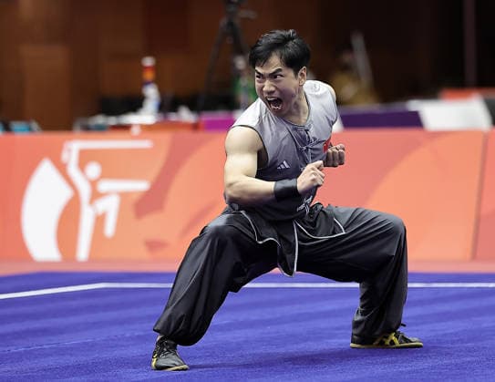 (260922) -- NAGOYA, Sept. 22, 2026 -- Li Jianming of China competes during the Nanquan round of the men s Nanquan and Nangun final of Wushu at the 20th Asian Games Aichi-Nagoya 2026 in Nagoya of Aichi Prefecture, Japan, Sept. 22, 2026. ) (SP)JAPAN-NAGOYA-ASIAN GAMES-WUSHU-MEN-NANQUAN & NANGUN LongxLei 