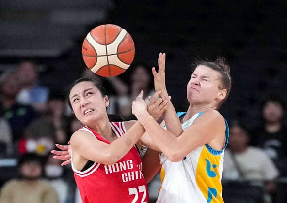 (260922) -- NAGOYA, Sept. 22, 2026 -- Tsui Wing Yu (L) of Hong Kong, China and Valeriya Kapitonova of Kazakhstan fight for the ball during the women s group B match between Hong Kong, China and Kazakhstan at 20th Asian Games Aichi-Nagoya 2026 in Nagoya, Japan, Sept. 22, 2026. ) (SP)JAPAN-NAGOYA-ASIAN GAMES-BASKETBALL-WOMEN S GROUP B-HKG VS KAZ LuoxYuan 