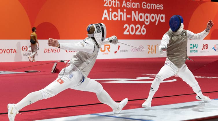(260922) -- TOKONAME, Sept. 22, 2026 -- Cheung Ka Long (L) of China s Hong Kong competes against Daniil Kravtsov of Uzbekistan during the men s foil individual table of 32 of fencing at the 20th Asian Games Aichi-Nagoya 2026 in Tokoname, Aichi Prefecture, Japan, Sept. 22, 2026. ) (SP)JAPAN-TOKONAME-ASIAN GAMES-FENCINGMEN S FOIL INDIVIDUAL-TABLE OF 32 YaoxQilin 