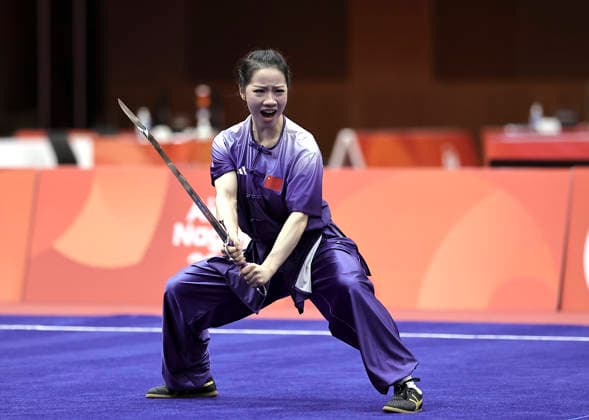 (260922) -- NAGOYA, Sept. 22, 2026 -- Zhang Yaling of China competes during the Nandao round of the Women s Nanquan and Nandao final of Wushu at the 20th Asian Games Aichi-Nagoya 2026 in Nagoya, Japan, Sept. 22, 2026. ) (SP)JAPAN-NAGOYA-ASIAN GAMES-WUSHU-WOMEN S NANQUAN & NANDAO LongxLei 