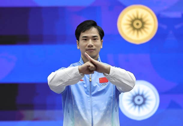 (260922) -- NAGOYA, Sept. 22, 2026 -- Li Jianming of China gestures during the awarding ceremony the men s Nanquan and Nangun of Wushu at the 20th Asian Games Aichi-Nagoya 2026 in Nagoya, Japan, Sept. 22, 2026. ) (SP)JAPAN-NAGOYA-ASIAN GAMES-WUSHU-MEN-NANQUAN & NANGUN LongxLei 