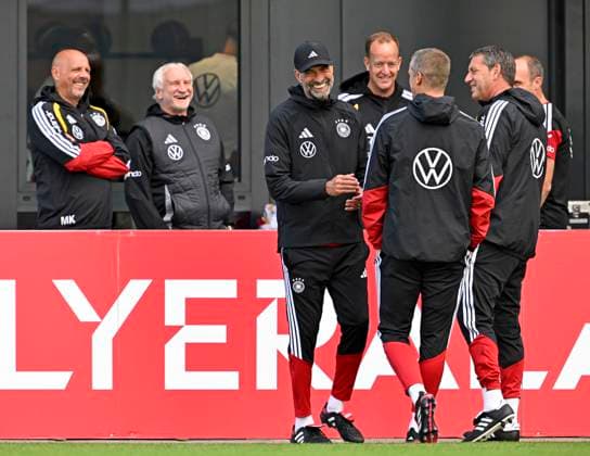 September 22, 2026, German National Soccer Team (DFB), training camp in Herzogenaurach, at the ADIDAS headquarters, ahead of the UEFA Nations League matches, national team training session in front of the press. Everyone is clearly having fun—Rudi Völler and coach Jürgen Klopp, both from Germany.