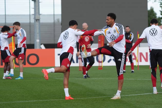 Felix Nmecha, Germany; Nadiem Amiri, Germany, warming up at Herzo Base on September 22, 2026; German National Team, Nations League preparation, home ground, HerzoBase, World of Adidas, Herzogenaurach