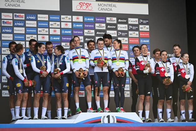 2026 UCI Road World Championships Picture by Zac Williams SWpix.com - 22 09 2026 - Cycling - 2026 UCI Road World Championships - Montrà al, Canada - Team Time Trial Mixed Relay Podium - Mattia Cattaneo, Filippo Ganna, Matteo Sobrero, Vittoria Guazzini, Elisa Longo Borghini, Monica Trinca Colonel (Italy) wins the Gold Medal to become World Champion with Bruno Armirail, Remi Cavagna, Jordan Labrosse, Juliette Berthet, Marion Borras, Cedrine Kerbaol (France) receiving the Silver Medal and Stefan Bissegger, Stefan Kung, Mauro Schmid, Jasmin Liechti, Marlen Reusser, Noemi Ruegg (Switzerland) receiving the Bronze Medal Copyright: x xSWpix.comx(t axPhotographyxHubxLtd)xZacxWilliams SWpix.comx SWP-3521-1328