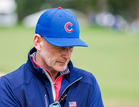 US team captain Brandt Snedeker wears a Chicago Cubs cap during practice for the Presidents Cup golf tournament at Medinah Country Club in Medinah, Illinois on Tuesday, September 22, 2026. Competition between the USA and the International team begins on Thursday, September 24 with Four-Ball play.  MED20260922918 TANNENxMAURY