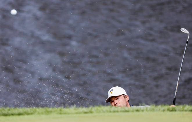Sam Burns of the US hits from a sand trap by the thirteenth green during practice for the Presidents Cup golf tournament at Medinah Country Club in Medinah, Illinois on Tuesday, September 22, 2026. Competition between the USA and the International team begins on Thursday, September 24 with Four-Ball play.  MED20260922919 TANNENxMAURY