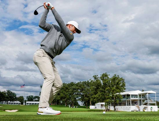 Sam Burns of the US hits a tee shot on the fourteenth hole during practice for the Presidents Cup golf tournament at Medinah Country Club in Medinah, Illinois on Tuesday, September 22, 2026. Competition between the USA and the International team begins on Thursday, September 24 with Four-Ball play.  MED20260922905 TANNENxMAURY