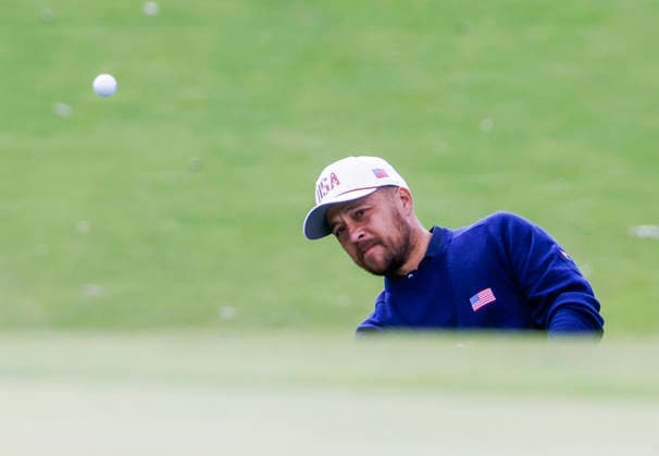 Xander Schauffele of the US chips onto the eleventh green during practice for the Presidents Cup golf tournament at Medinah Country Club in Medinah, Illinois on Tuesday, September 22, 2026. Competition between the USA and the International team begins on Thursday, September 24 with Four-Ball play.  MED20260922911 TANNENxMAURY