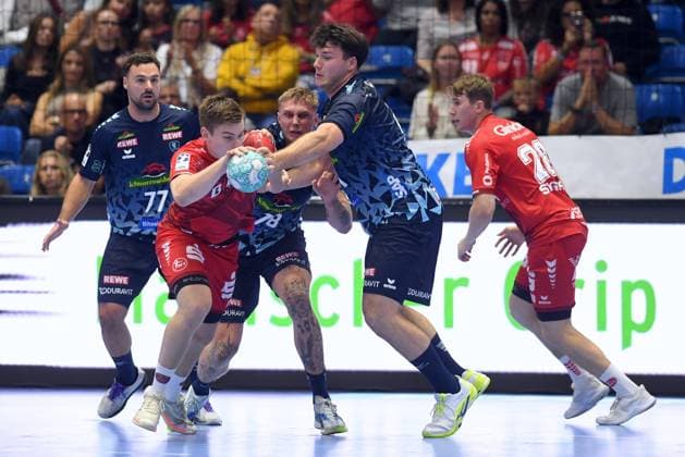 Reynir Thor Stefansson, MT Melsungen 19, on the ball; Aron Seesing, Rhein Neckar Löwen 21, R; Dani Baijens, Rhein Neckar Löwen 77, L; Edwin Aspenbaecker, Rhein Neckar Löwen 78, m, in the back; Luca Sigrist, MT Melsungen 28 R, GER, MT Melsungen vs. Rhein Neckar Löwen, handball, DHB Cup, 2nd round, 2026–2027 season, September 22, 2026, GER, MT Melsungen Rhein Neckar Löwen, handball, DHB Cup, 2nd round, 2026–2027 season, September 22, 2026, Kassel Copyright: xEibner-Pressefotox xRolandxSippelx EP_RSL