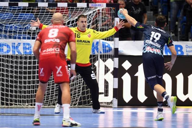 Marius Steinhauser of Rhein Neckar Löwen (19) takes a shot; Nebojsa Simic, goalkeeper for MT Melsungen (16); Adrian Sipos of MT Melsungen (8); GER, MT Melsungen Rhein Neckar Löwen, Handball, DHB Cup, Round 2, 2026–2027 season, September 22, 2026, GER, MT Melsungen Rhein Neckar Löwen, Handball, DHB Cup, Round 2, 2026–2027 season, September 22, 2026, Kassel Copyright: xEibner-Pressefotox xRolandxSippelx EP_RSL