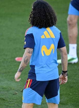 Spanish national football team prepares for UEFA Nations League match against England MADRID, SPAIN - SEPTEMBER 22: A view of portrait tattoo depicting Spain head coach Luis de la Fuente on the arm of Marc Cucurella during open practice session ahead of 2026-27 UEFA Nations League C match against England at the Royal Spanish Football Federation s (RFEF) Las Rozas facility in Madrid, Spain on September 22, 2026. Burak Akbulut Anadolu Madrid Spain. Editorial use only. Please get in touch for any other usage.  Copyright: x2026xAnadoluxBurakxAkbulutx