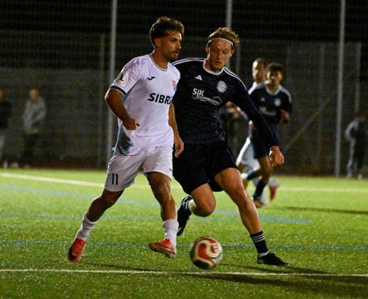 September 22, 2026, xpsx, Soccer: Hessen Cup Round of 16, Germania Dörnigheim vs. TSV Steinbach Haiger; from left: Serkan Firat (Steinbach), Frederik Novak (Dörnigheim), Maintal, Hessen, Germany, DEU