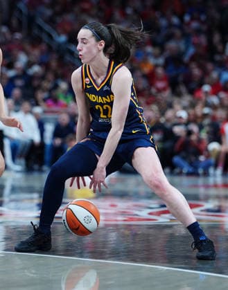 INDIANAPOLIS, IN - SEPTEMBER 22: Indiana Fever guard Caitlin Clark (22) dribbles between her legs during a game against the Minnesota Lynx on September 22, 2026, at Gainbridge Fieldhouse in Indianapolis, Indiana. (Photo by Brian Spurlock Icon Sportswire) WNBA, Basketball Damen, USA SEP 22 Minnesota Lynx at Indiana Fever EDITORIAL USE ONLY Icon26092252