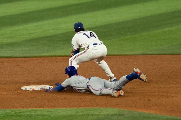 New York Mets Vs Texas Rangers - September 22, 2026 Brett Baty of the New York Mets slides into second base during the game between the New York Mets and Texas Rangers at Globe Life Field in Arlington, Texas, on September 22, 2026. Arlington Texas United States  Copyright: xSethxGarberx originalFilename:garber-newyorkm260922_npjJ6.jpg