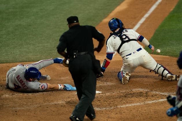 New York Mets Vs Texas Rangers - September 22, 2026 Francisco Alvarez of the New York Mets slides into home on a sacrifice fly during the game between the New York Mets and Texas Rangers at Globe Life Field in Arlington, Texas, on September 22, 2026. Arlington Texas United States  Copyright: xSethxGarberx originalFilename:garber-newyorkm260922_npQSy.jpg