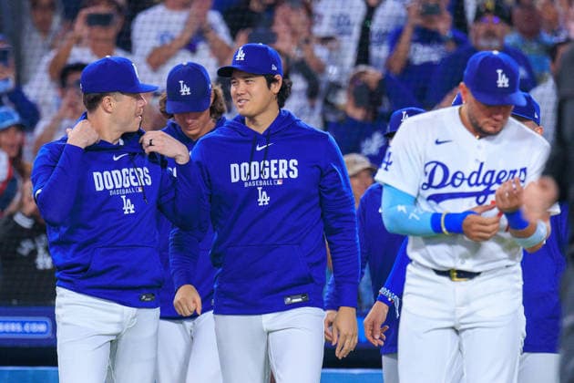 September 22, 2026, Los Angeles, California, USA: Shohei Ohtani 17 of the Los Angeles Dodgers goes to shake hands with teammates after winning a regular-season MLB, Baseball Herren, USA game against the San Diego Padres on Tuesday September 22, 2026 at Dodger Stadium in Los Angeles, California. Dodgers defeat Padres, 7-0. JAVIER ROJAS PI Los Angeles USA - ZUMAp124 20260922_zaa_p124_031 Copyright: xJavierxRojasx