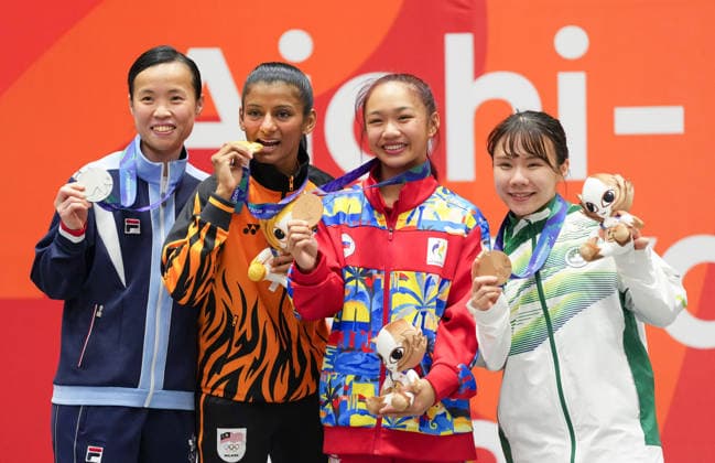 (260923) -- TOYOHASHI, Sept. 23, 2026 -- Gold medalist Shahmalarani Chandran (2nd L) of Malaysia, silver medalist Tsang Yee Ting (1st L) of China s Hong Kong, bronze medalists Fong Man Wai (1st R) of China s Macao and Marie June Adriano of the Philippines pose for photos during the awarding ceremony for the women s kumite -50kg final of Karate at the 20th Asian Games Aichi-Nagoya 2026 in Toyohashi of Aichi Prefecture, Japan, Sept. 23, 2026. ) (SP)JAPAN-TOYOHASHI-ASIAN GAMES-KARATE-WOMEN S KUMITE-50KG FINAL WangxFei 