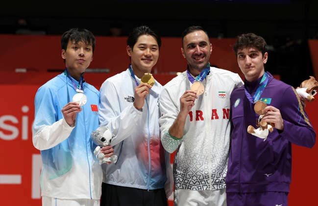 (260923) -- TOKYO, Sept. 23, 2026 -- Gold medalist Oh Sanguk (2nd L) of South Korea, silver medalist Shen Chenpeng (1st L) of China and bronze medalist Seyed Ali Esmaeilzadeh Pakdaman (2nd R) of Iran and Artyom Sarkissyan of Kazakhstan pose during the awarding ceremony for the men s sabre at the 20th Asian Games Aichi-Nagoya 2026 in Tokyo, Japan, Sept. 23, 2026. ) (SP)JAPAN-NAGOYA-ASIAN GAMES-FENCING-MEN S SABRE INDIVIDUAL-FINAL YaoxQilin 