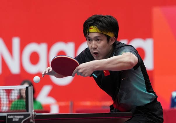 (260923) -- TOYOTA, Sept. 23, 2026 -- Wang Chuqin of China hits a return against Lin Yun-ju of Chinese Taipei during the men s team semifinal match between China and Chinese Taipei at the 20th Asian Games Aichi-Nagoya 2026 in Toyota of Aichi Prefecture, Japan, Sept. 23, 2026. ) (SP)JAPAN-TOYOTA-ASIAN GAMES Table tennis, Tischtennis MEN S TEAM-SEMIFINAL-CHN VS TPE CheongxKamxKa 