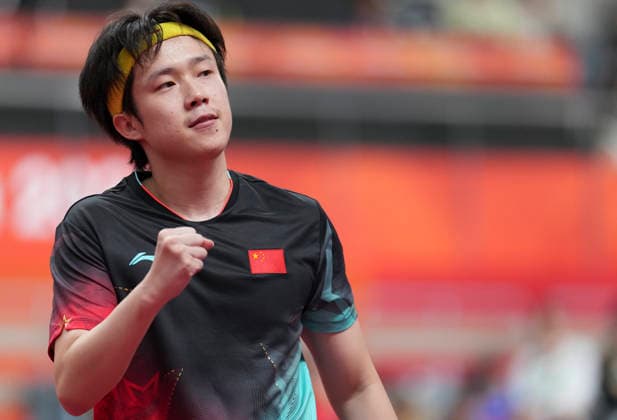 (260923) -- TOYOTA, Sept. 23, 2026 -- Wang Chuqin of China celebrates against Lin Yun-ju of Chinese Taipei during the men s team semifinal match between China and Chinese Taipei at the 20th Asian Games Aichi-Nagoya 2026 in Toyota of Aichi Prefecture, Japan, Sept. 23, 2026. ) (SP)JAPAN-TOYOTA-ASIAN GAMES Table tennis, Tischtennis MEN S TEAM-SEMIFINAL-CHN VS TPE CheongxKamxKa 