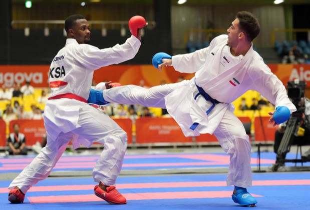 (260923) -- TOYOHASHI, Sept. 23, 2026 -- Mahmoud Nemati (R) of Iran competes against Sanad Hassan Y Sufyani of Saudi Arabia during the men s kumite +84kg final of Karate at the 20th Asian Games Aichi-Nagoya 2026 in Toyohashi of Aichi Prefecture, Japan, Sept. 23, 2026. ) (SP)JAPAN-TOYOHASHI-ASIAN GAMES-KARATE-MEN S KUMITE +84KG FINAL WangxFei 