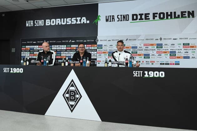 Introduction of Alexander Blessin as the new head coach of Borussia Mönchengladbach on September 23, 2026, at ista Borussia Park in Mönchengladbach. Rouven Schröder, Head of Sports for Mönchengladbach, on the left: Lübbo Popken, press spokesperson for Mönchengladbach; in the center: Alexander Blessin, head coach of Mönchengladbach; on the right xRx