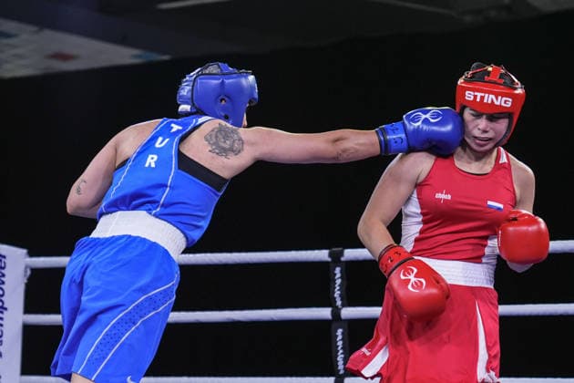 2026 European Boxing Championships SOFIA, BULGARIA - SEPTEMBER 23: Busenaz Surmeneli of Turkiye (blue) in action against Nadezhda Golubeva of Russia (red) during the Women s 70kg category match at the 2026 European Boxing Championships held at the Asics Arena in Sofia, Bulgaria, on September 23, 2026. Osmancan Gurdogan Anadolu Sofia Bulgaria. Editorial use only. Please get in touch for any other usage.  Copyright: x2026xAnadoluxOsmancanxGurdoganx